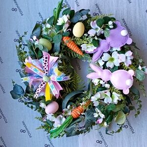 Easter Wreath with Bunnies Eggs Carrots Flowers and Greenery